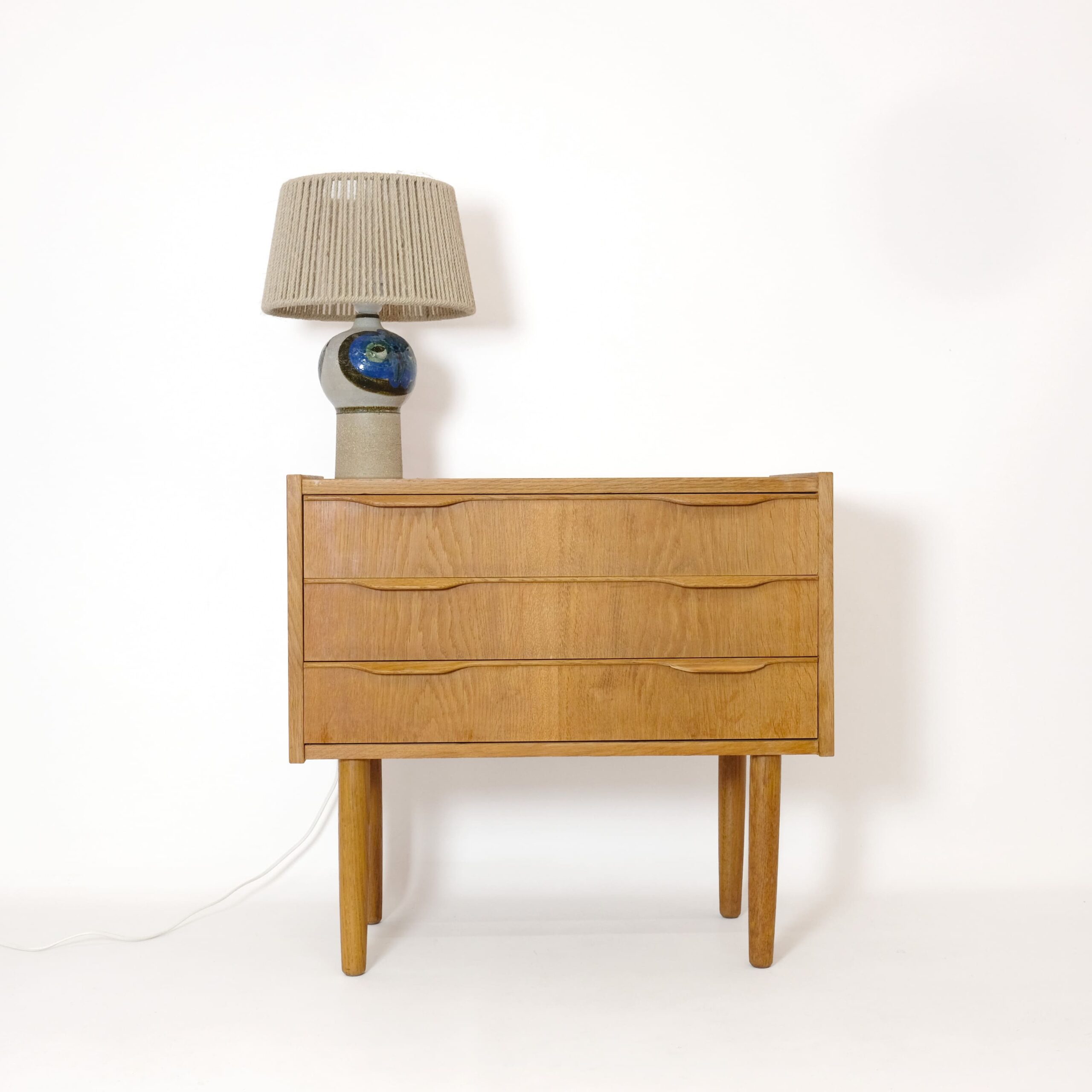 Bedside table with drawers from the 1960s.