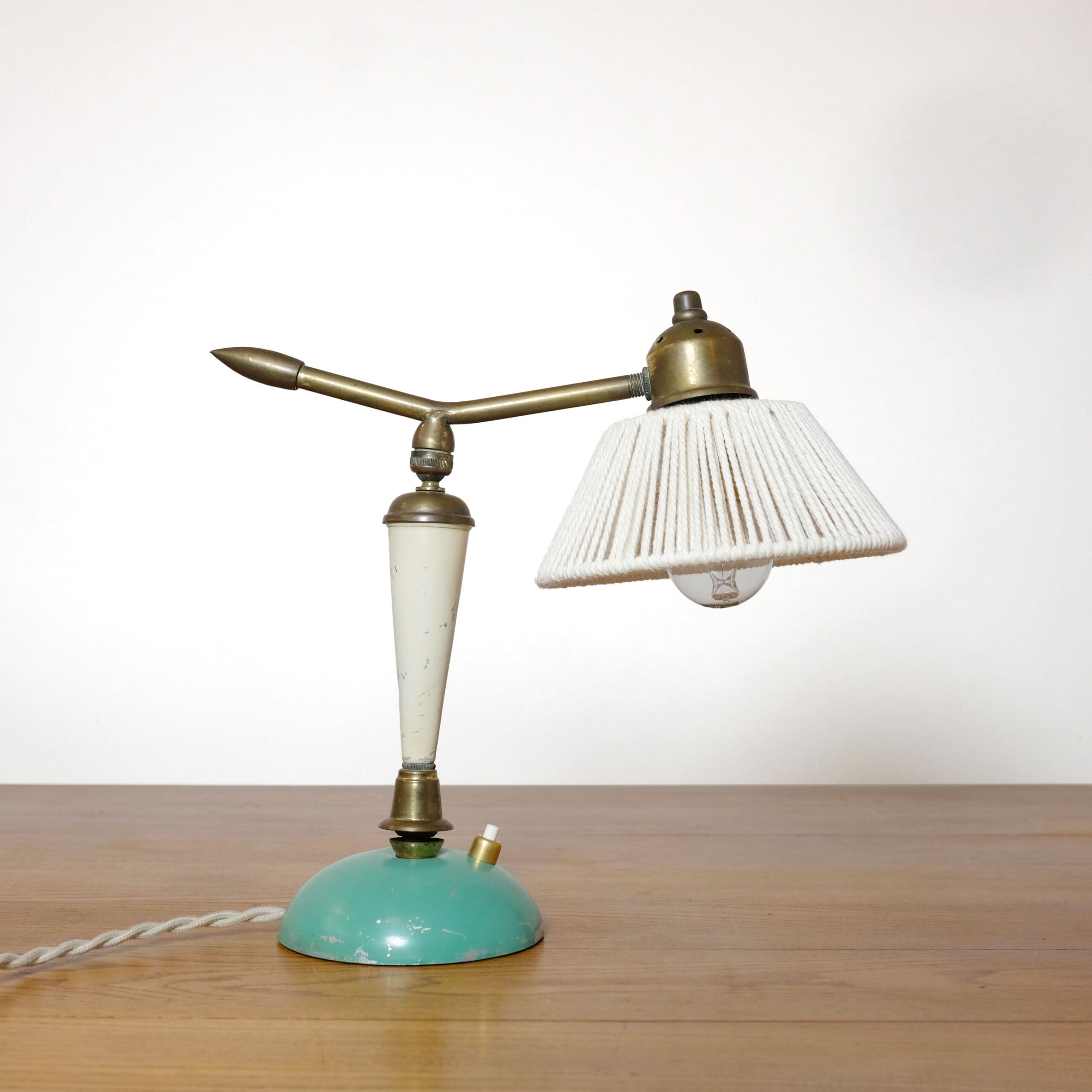 Little brass and metal lamp with a cotton shade, France, 1950s.